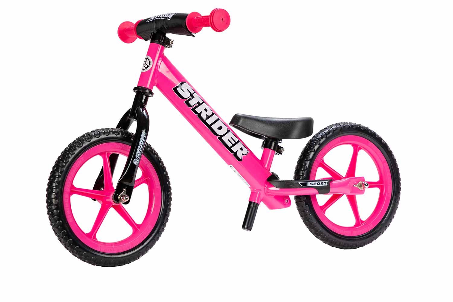 Bubblegum pink Strider Balance bike with pink wheels