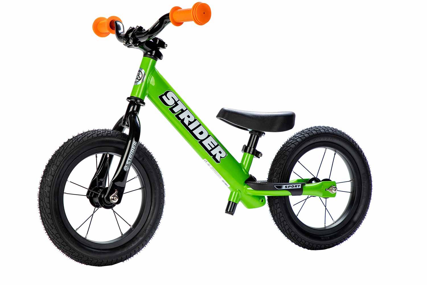 The Trailblazer Strider Custom Build, featuring a Green Strider 12 Sport, High Traction Wheels, and assorted accessories