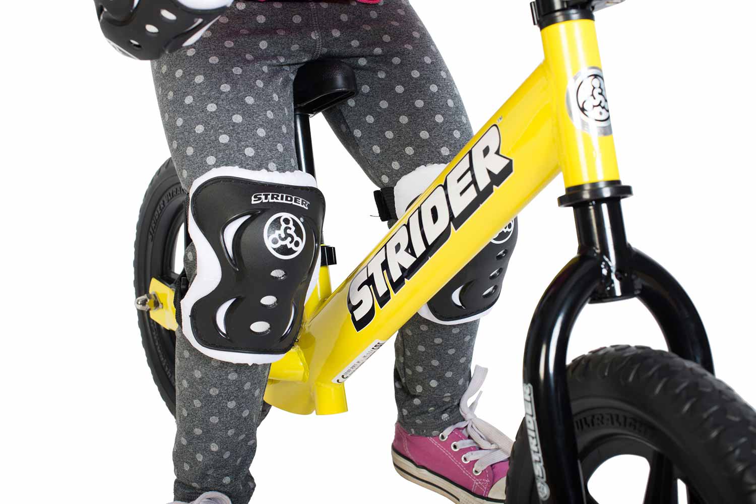 close up photo of child wearing a Strider knee pad