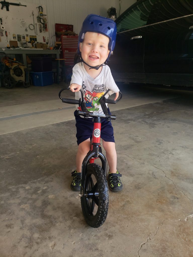 Tabor on his Adaptive Strider Bike