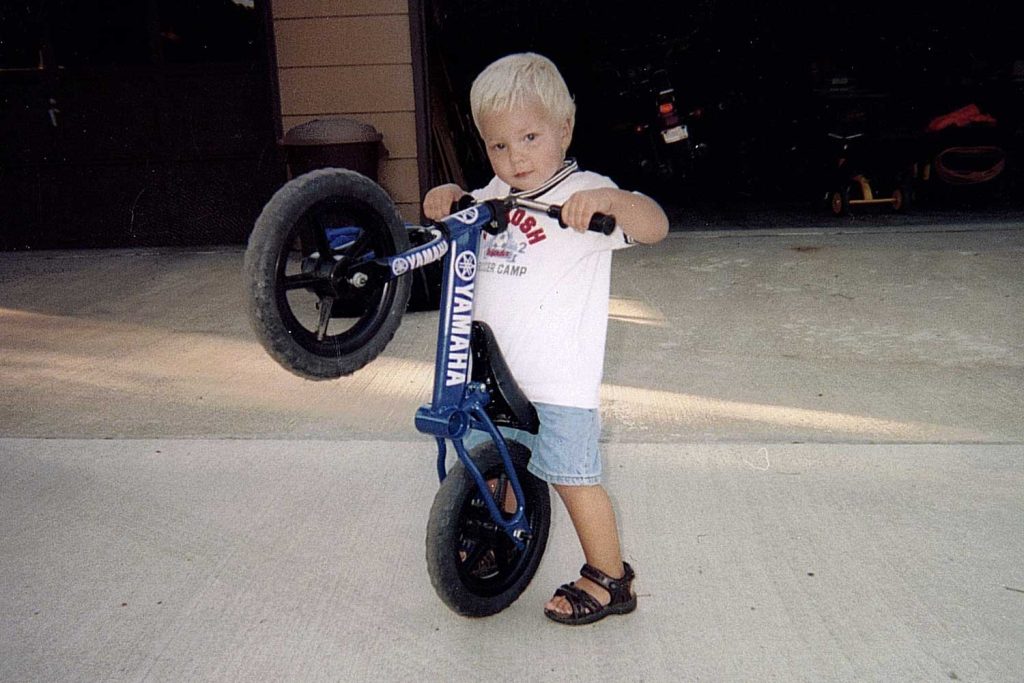 Bode McFarland doing a wheelie on the first Strider Bike prototype